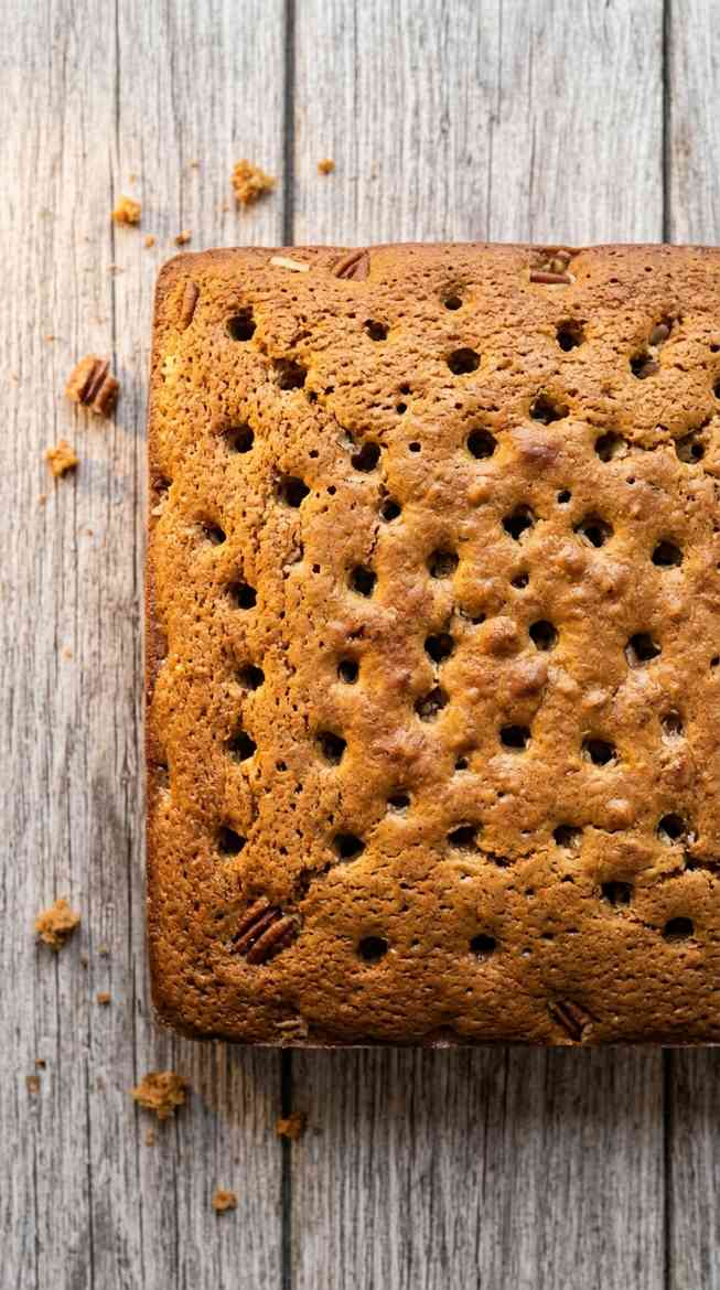 butter-pecan-praline-poke-cake-process-step-4-poking-holes