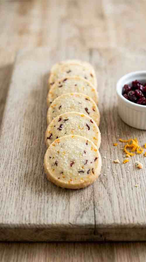 cranberry-orange-shortbread-cookies-hero-sliced-board