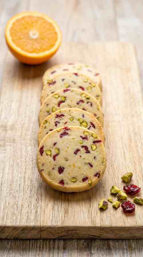 cranberry-pistachio-shortbread-cookies-hero-sliced-board