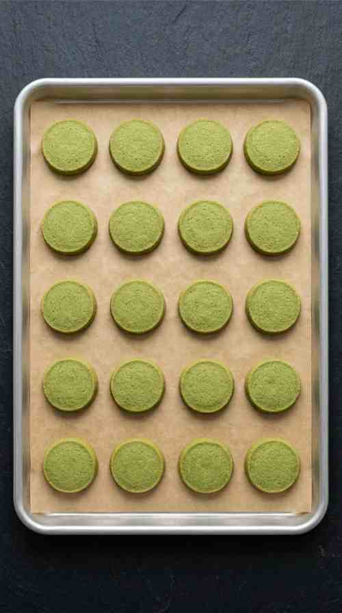 matcha-shortbread-cookies-process-step-6-slicing-and-baking-cookies-on-baking-sheet