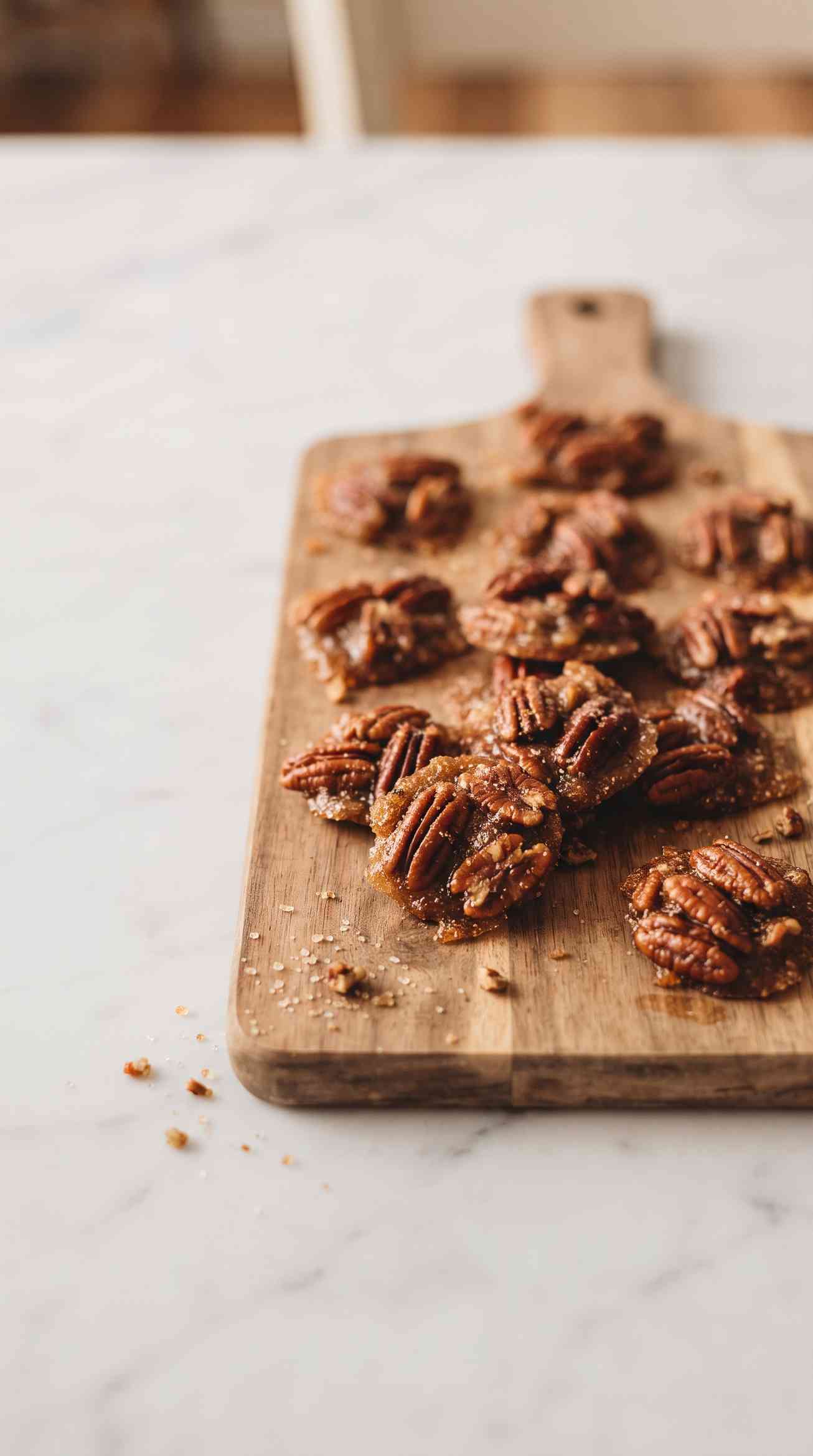 pecan-pralines-hero-shot-2-scattered-on-board