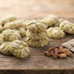 pistachio-crinkle-cookies-landscape-hero-wood-spread