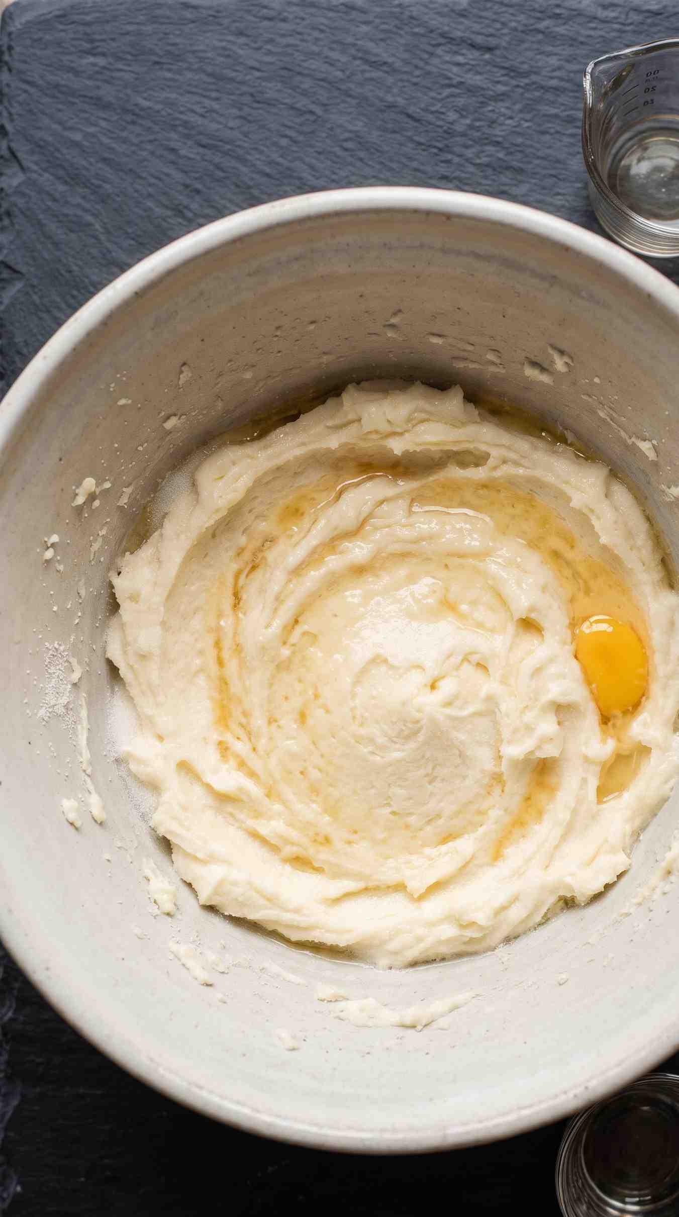 turtle-thumbprint-cookies-process-2-add-egg-yolks-vanilla-v2